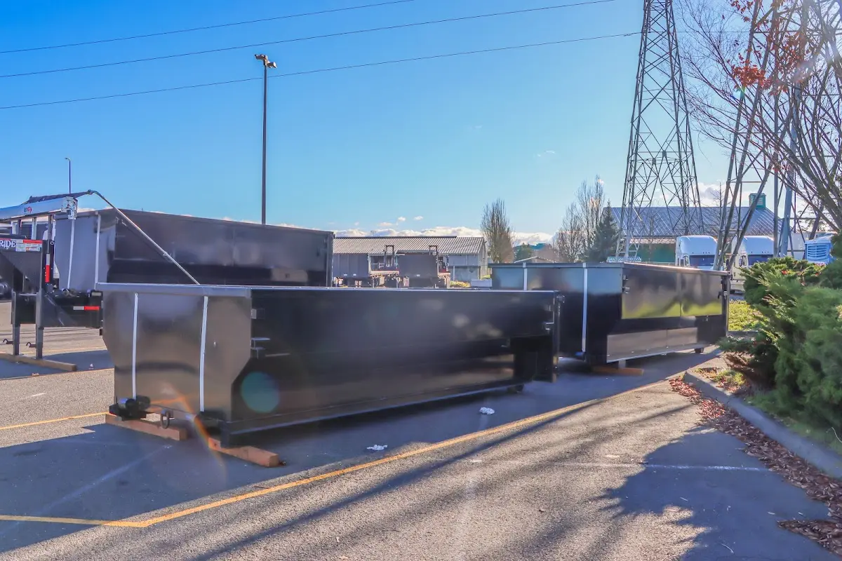 Roll-off dumpster ready for waste disposal at job site for 6 Yard Dumpster Rental in Arlington